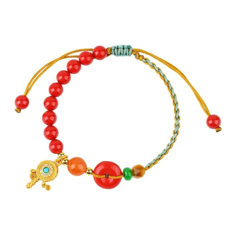 Emperor red sand cinnabar bracelet with hand-woven geometric patterns and peace buckle closure