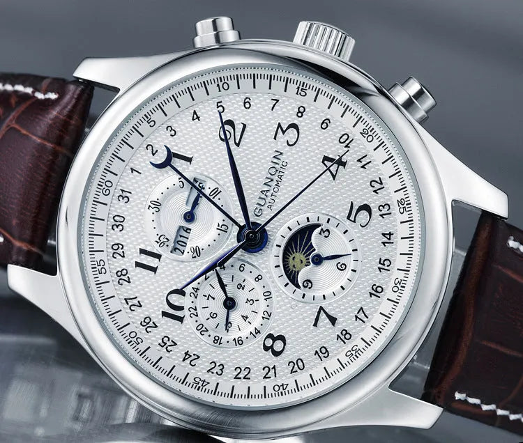 Men's black dial perpetual calendar watch with leather strap showing moon phase display