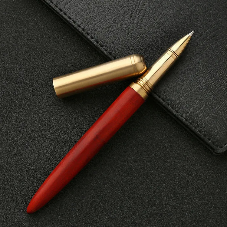 Solid wood and brass signature pen showing choice of ebony, rosewood, sandalwood, tiger skin wood, and wingwood finishes.