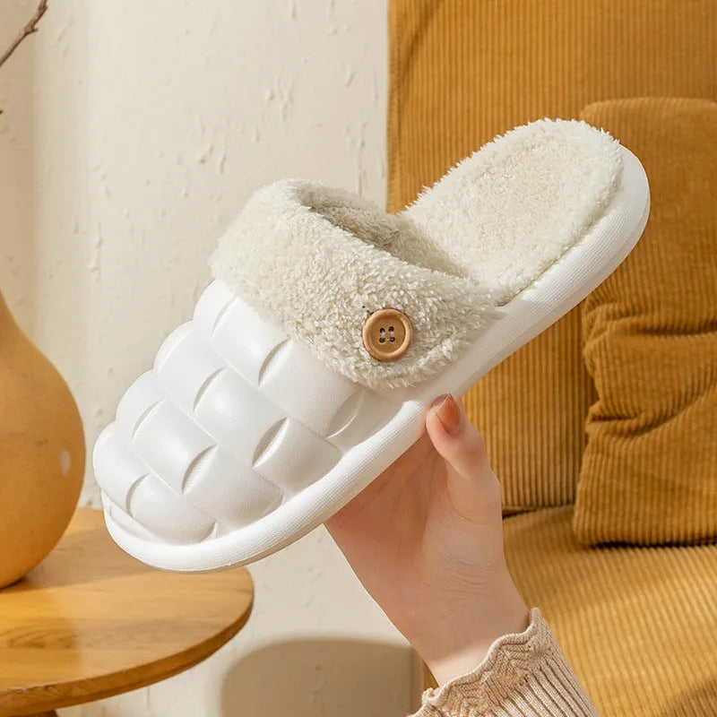A pair of pink detachable EVA slippers with plush lining and a textured sole.