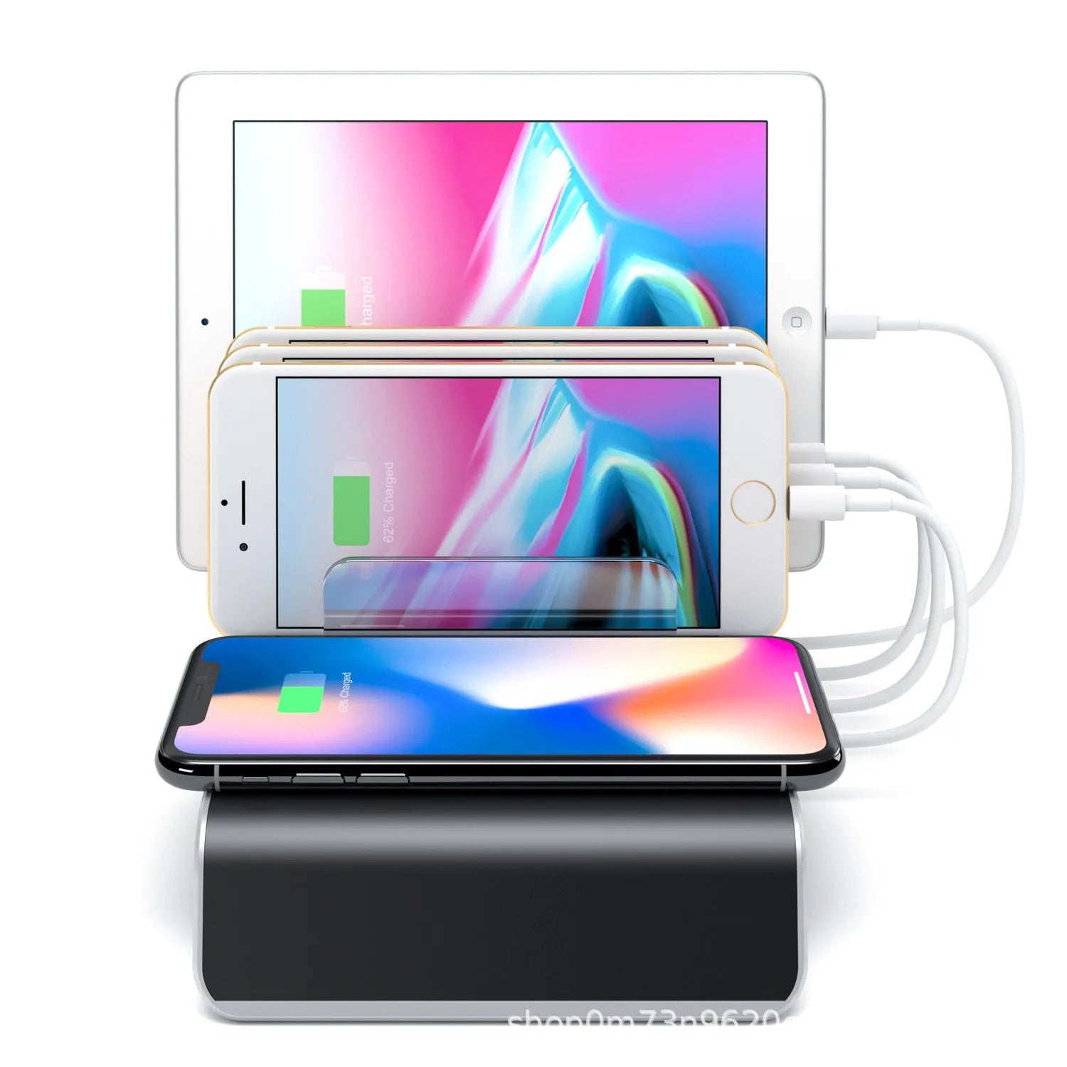 Black universal mobile phone and tablet charging stand base on a desk