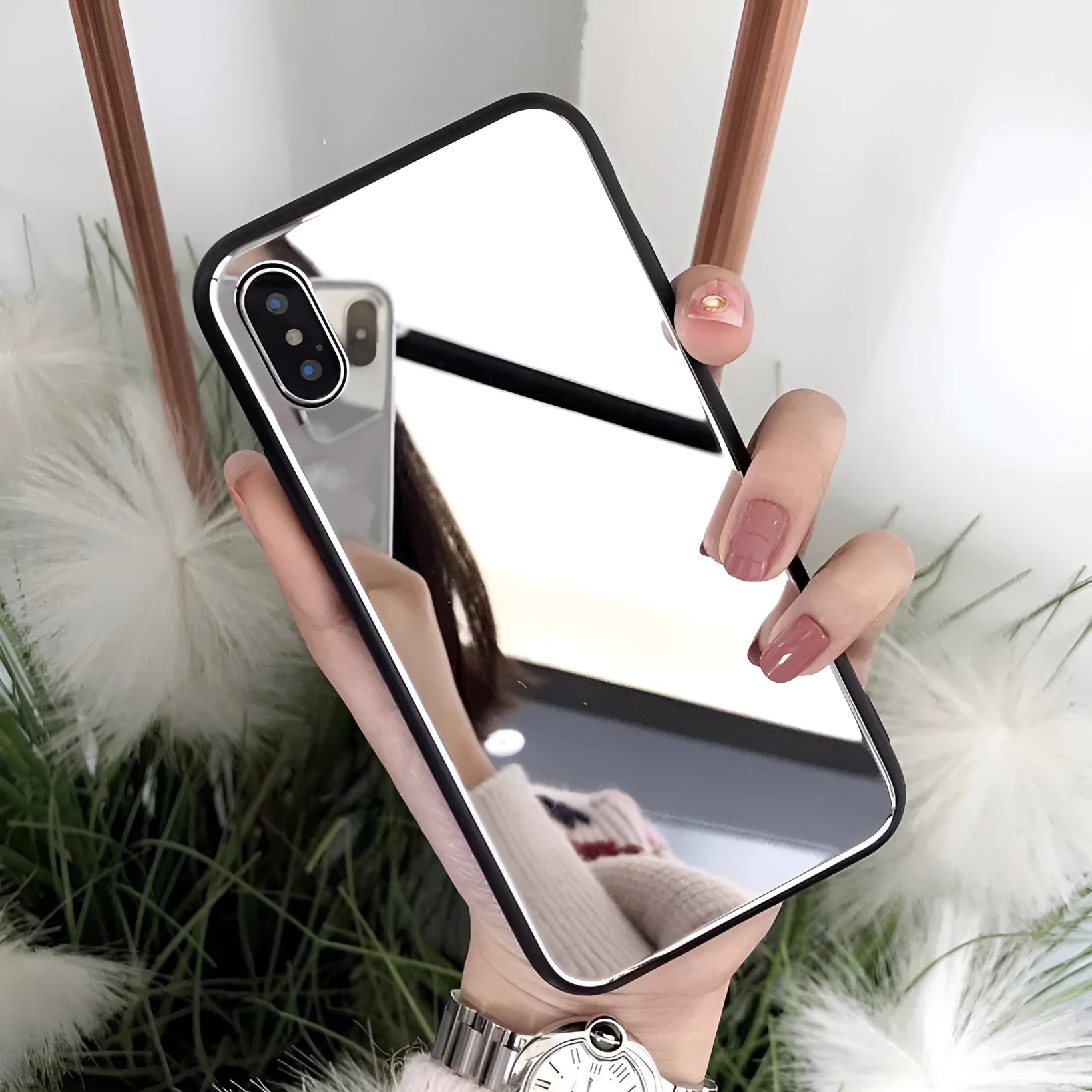 Black mirror phone case for Apple iPhone showing reflective surface on the back cover.