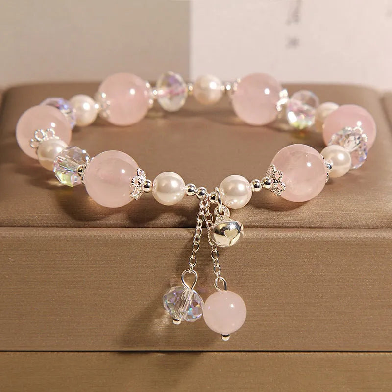 Natural pink crystal bracelet for women with pearl and bell accent, Japanese Korean style