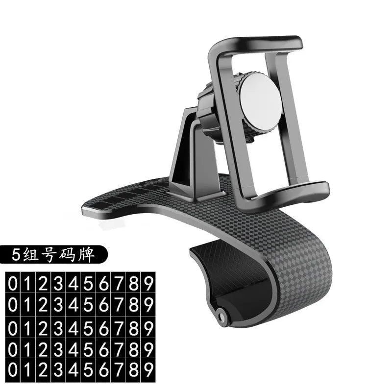 Black 360-degree rotating adjustable car phone holder mounted on a dashboard