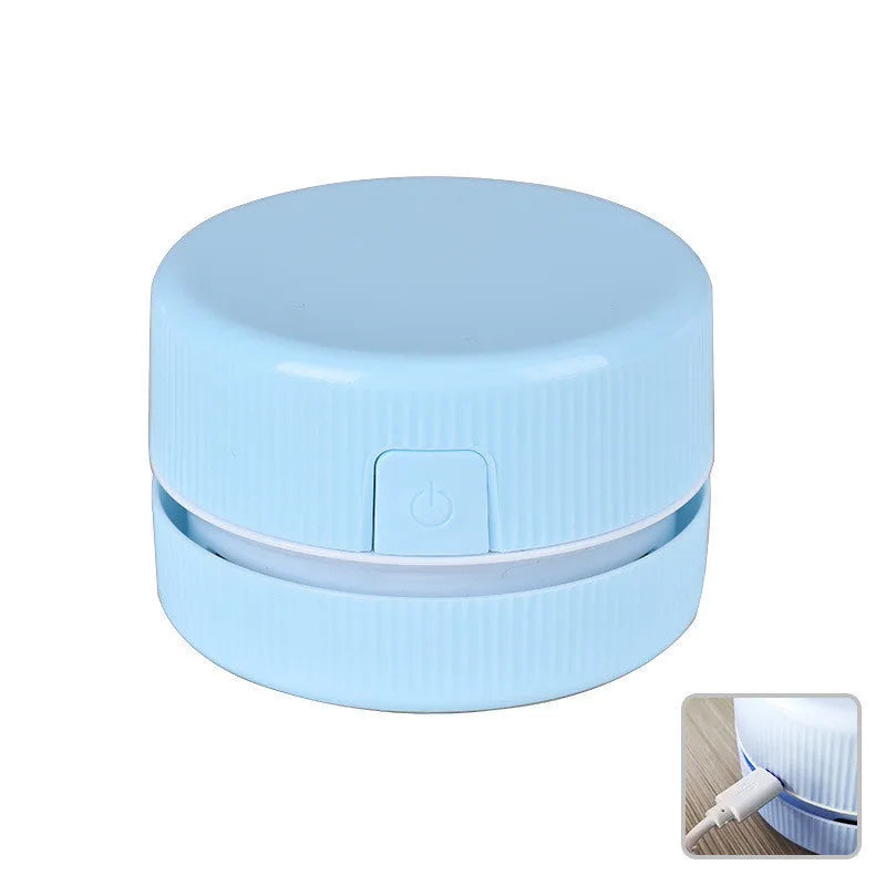 Portable mini desktop vacuum cleaner for pencil chips in pink colour with rechargeable battery
