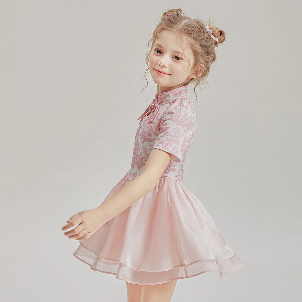 Kids' patchwork pattern two-piece swimsuit with short sleeves and briefs bottoms in various size options