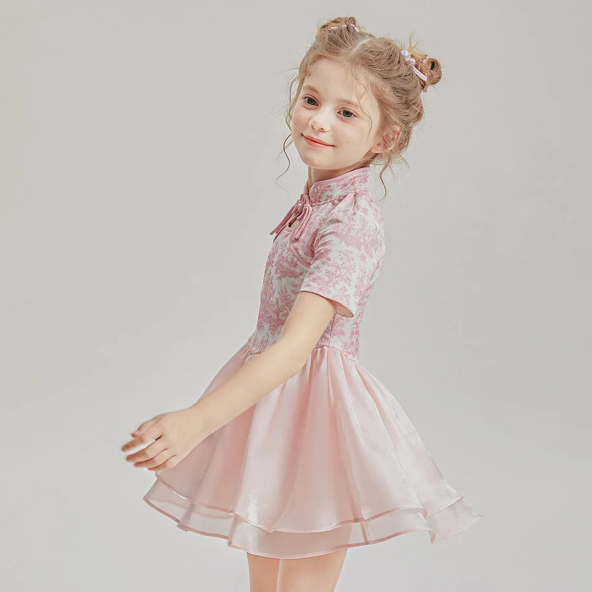 Kids' patchwork pattern two-piece swimsuit with short sleeves and briefs bottoms in various size options