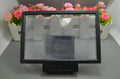 Black and white screen amplifier measuring 18cm long by 12cm wide