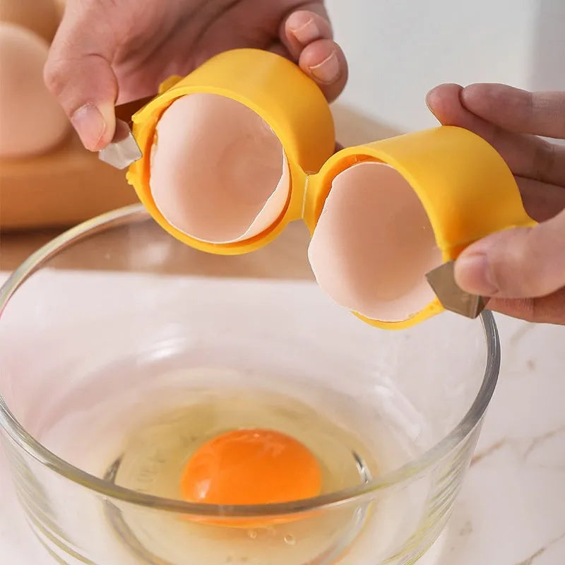 Egg shell opener kitchen tool in orange colour with stainless steel blades