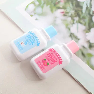 White creative correction tape dispenser shaped like a cute bottle with a curved ergonomic design
