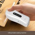 Milky white portable USB sealing machine with magnetic patch for kitchen food preservation