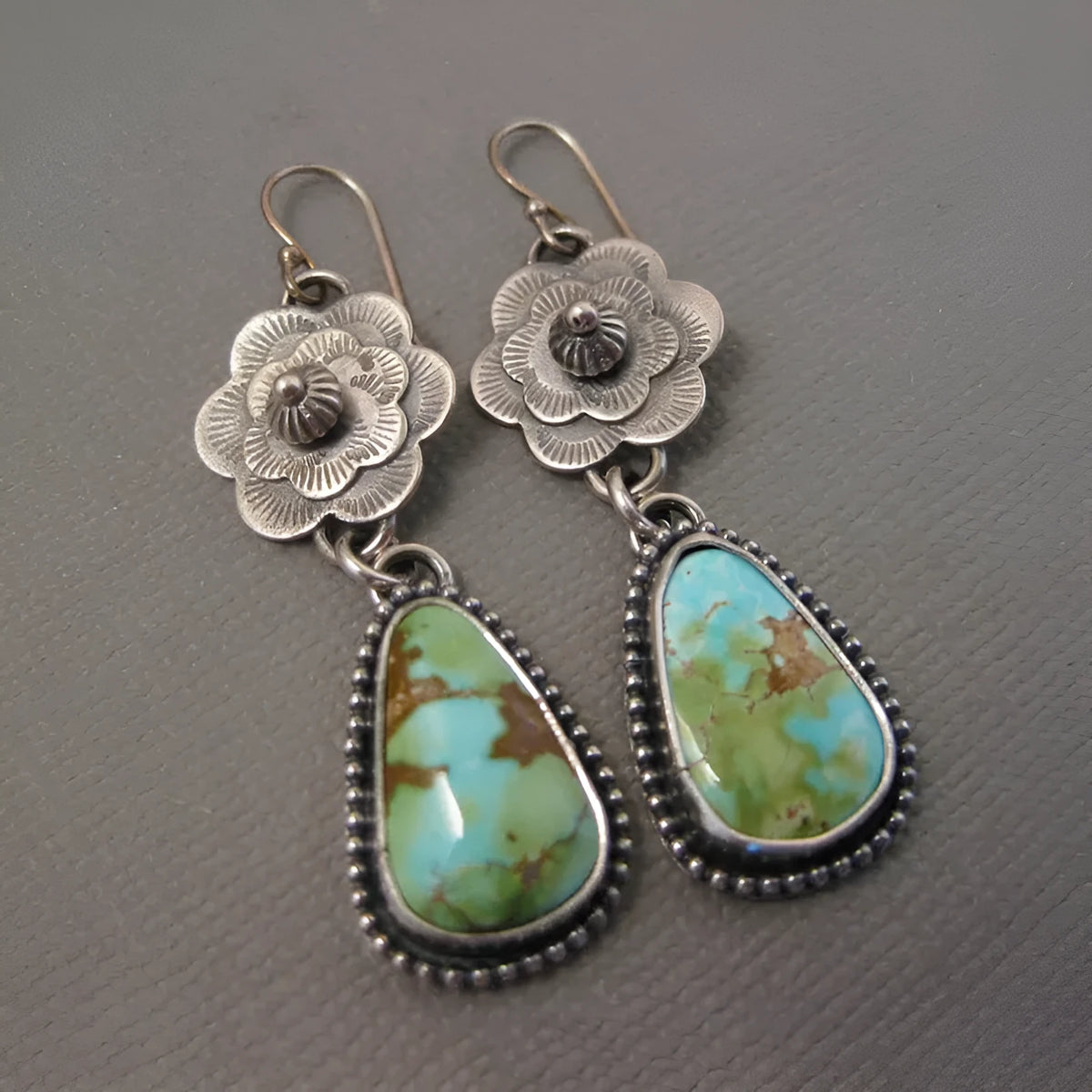 Silver metal carved floral tassel earrings in retro vintage botanical style for women