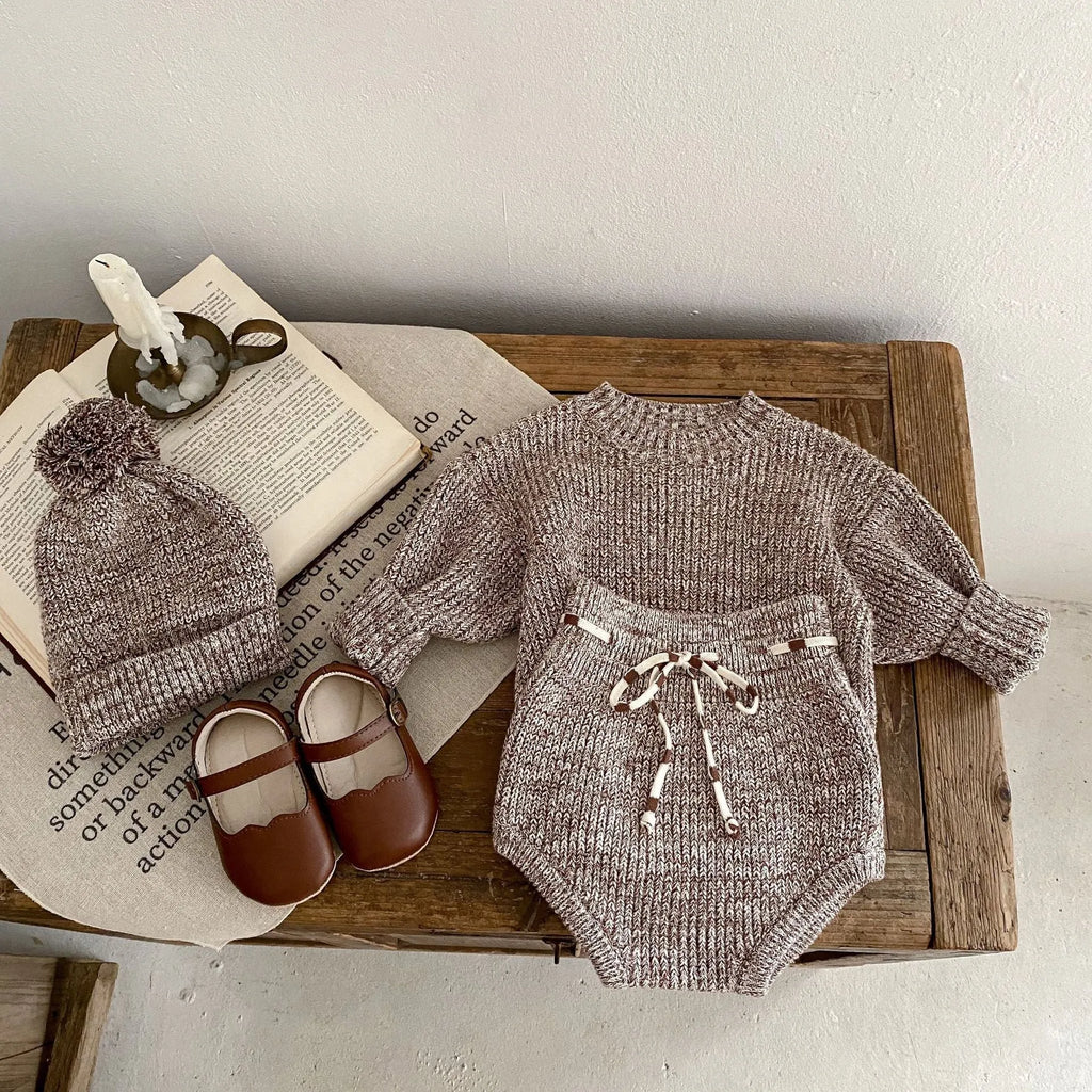 Dark brown cotton knitted three-piece set for infant girl with fur ball hat