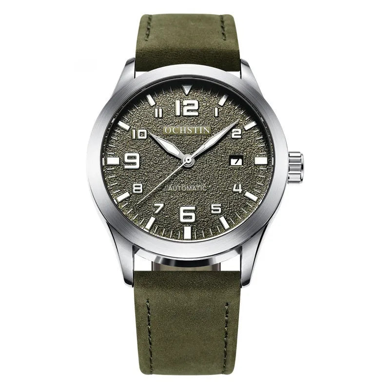 Men's automatic mechanical watch with leather strap on wrist, showing silver case and army green dial option.