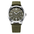 Men's automatic mechanical watch with leather strap on wrist, showing silver case and army green dial option.