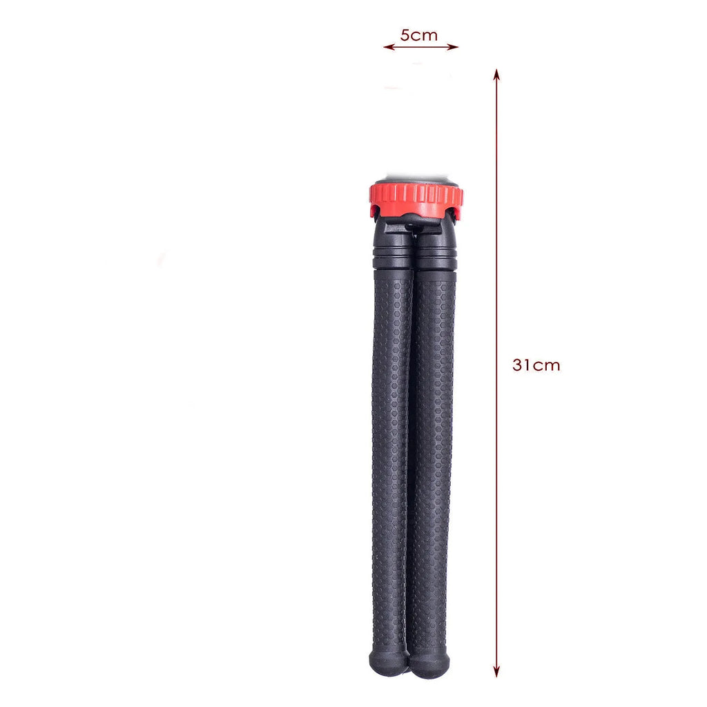 Black octopus tripod with spherical gimbal head wrapped around pole supporting mobile phone