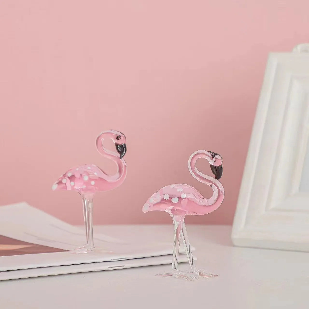 Pink crystal flamingo decorative ornament in modern style on table