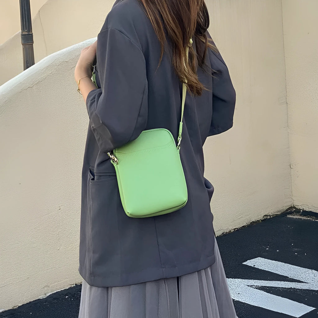 Small solid colour PU leather crossbody shoulder bag for mobile phone in beige.