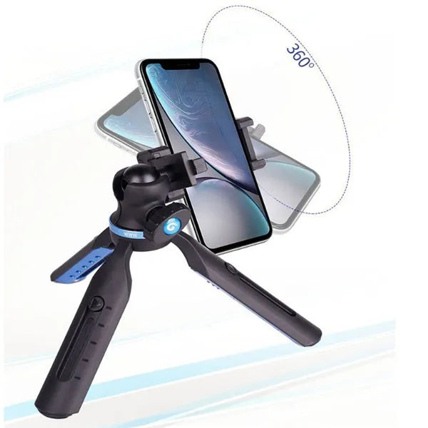 Black desktop tripod holding an iPhone, made from aluminium alloy and plastic, on a wooden table.