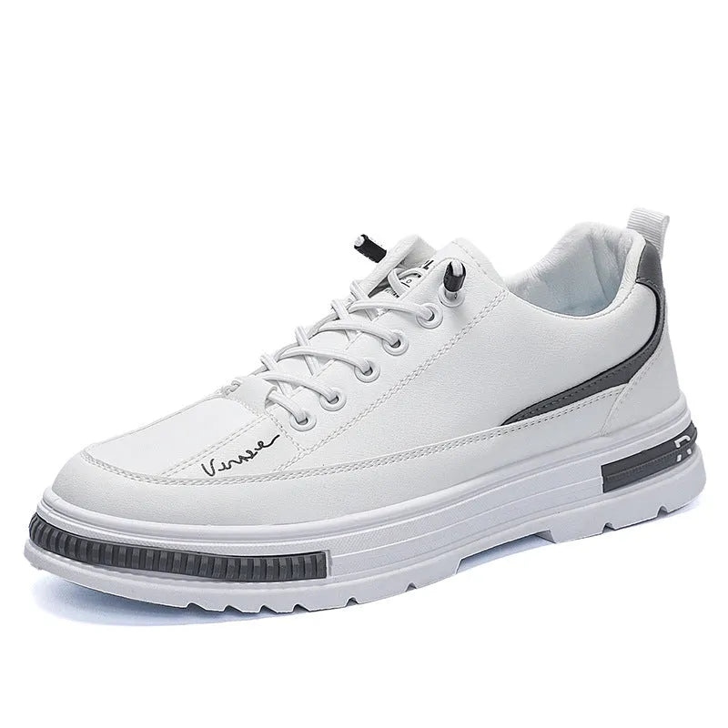 Men's white low-top platform sneakers with round toe and elastic band design on a plain background.