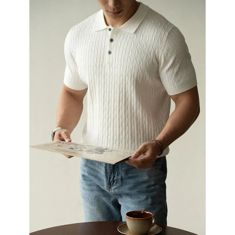 Men's khaki short sleeve business casual top laid flat, showing collar and button placket detail.