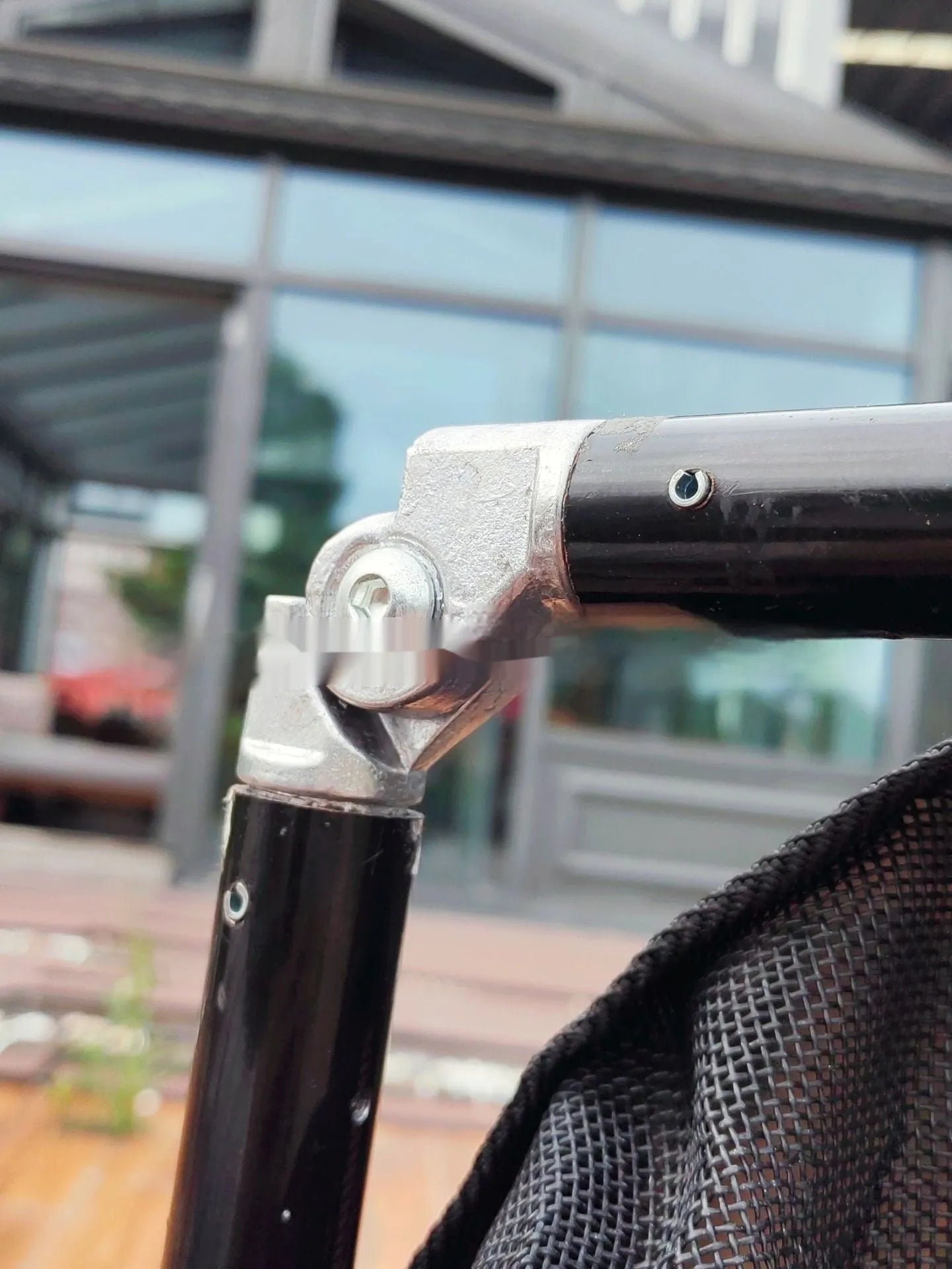 Black aluminium alloy folding pet stretcher for large dog emergency transport.