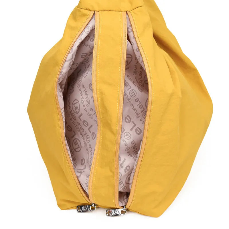 Heart-shaped nylon underarm bag for women in black, blue, khaki, or yellow with large capacity storage