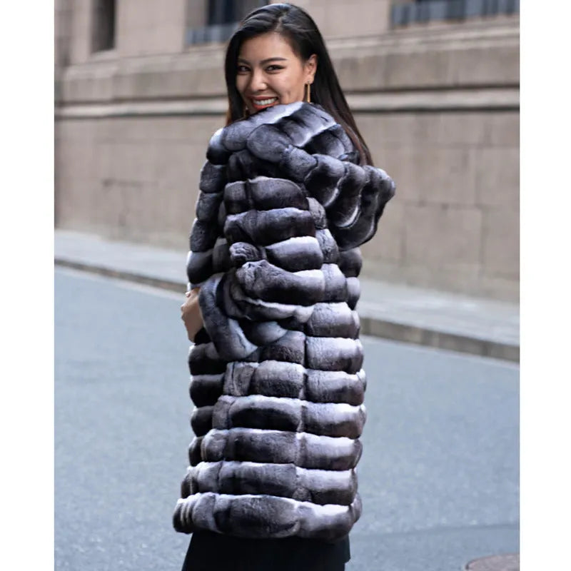 Women's zebra stripe faux fur overcoat with a 65cm medium length on a hanger