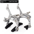 Black and silver U-shaped metal bicycle brake clamps with mounting screws for road bike installation.