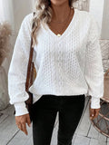 Woman's loose fit milky white long sleeve T-shirt with 3D pattern detail