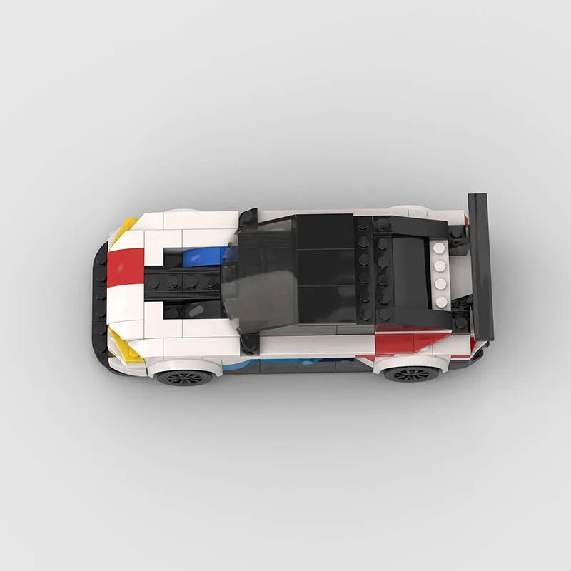 BMW M8 GTE building block car model kit assembled on a flat surface, showing 17cm length and plastic construction