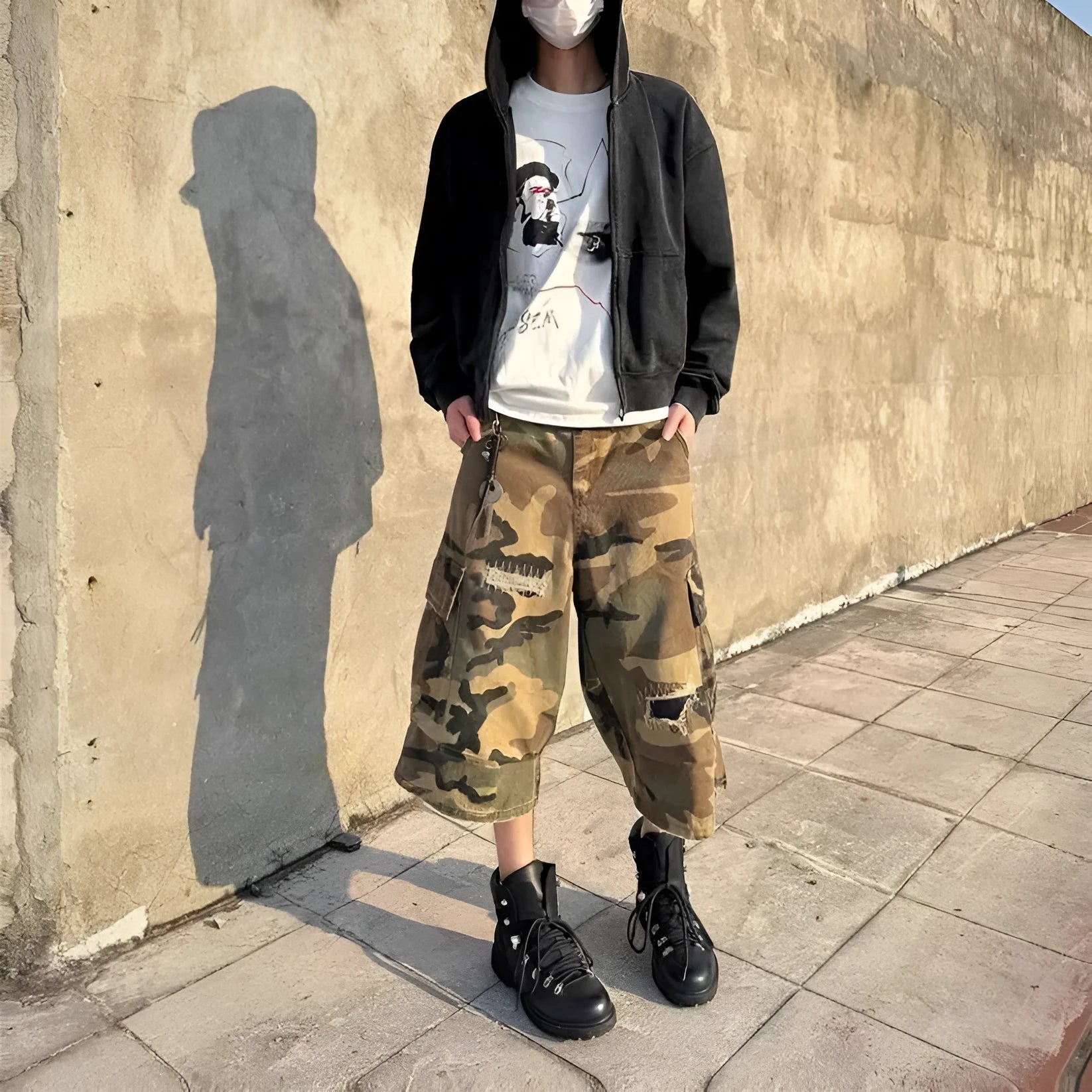 Men's loose-fit camouflage cropped jeans with ripped patches and straight leg