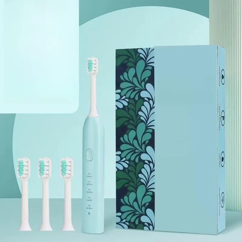 Small yellow duck design rechargeable electric toothbrush with soft bristles.