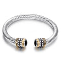 Two-tone vintage gold stainless steel bangle bracelet in black and golden finish