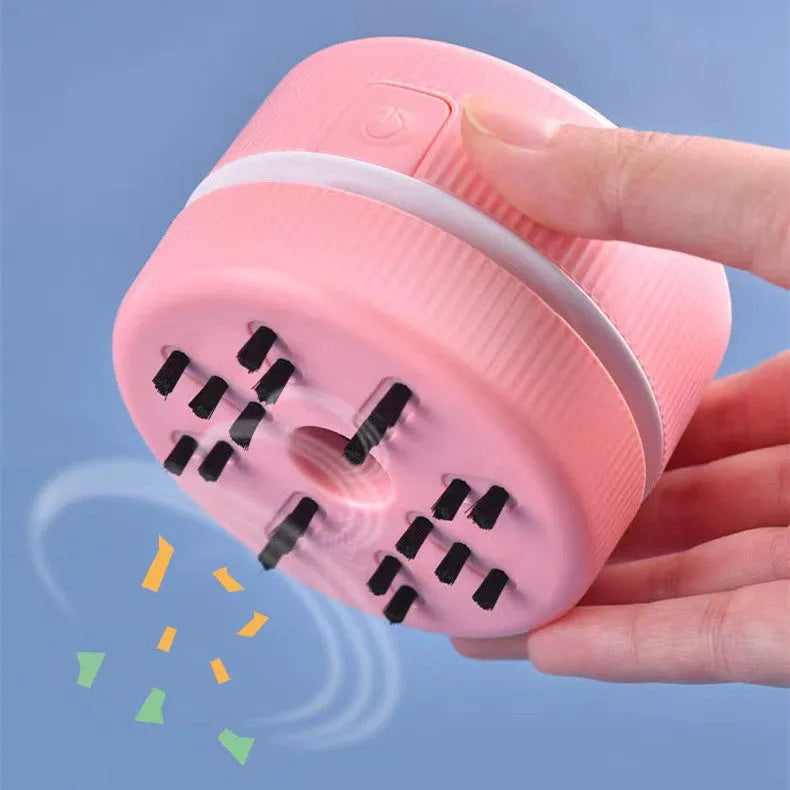 Portable mini desktop vacuum cleaner for pencil chips in pink colour with rechargeable battery
