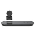 3 in 1 wireless charger in black with Galaxy Watch Active and earbuds placed on charging zones