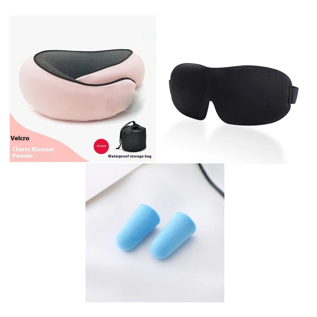 U-shaped navy blue memory foam travel neck pillow rolled up next to a mobile phone showing compact size