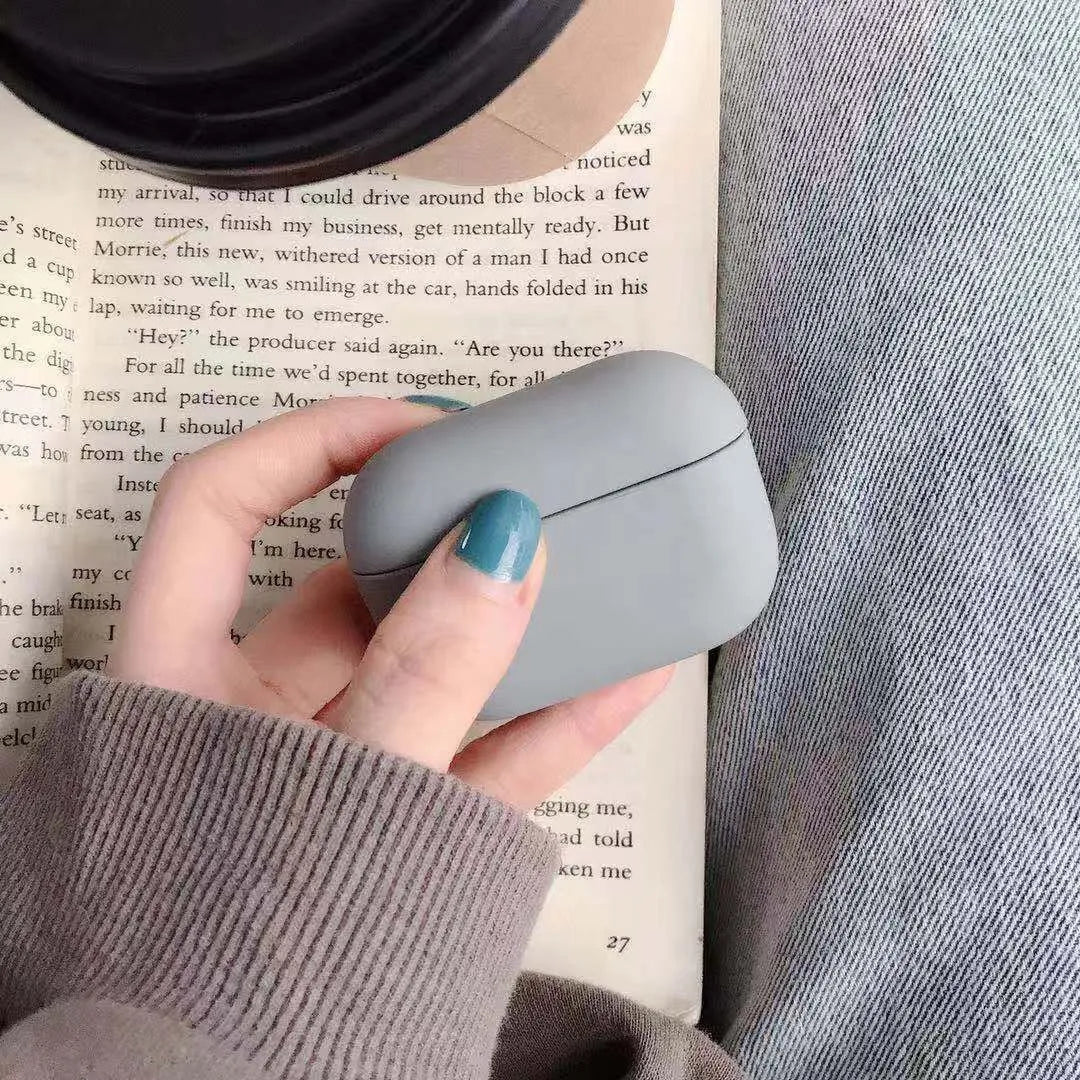 Plastic protective case for AirPods Pro in multiple colour options including light blue and grass green.