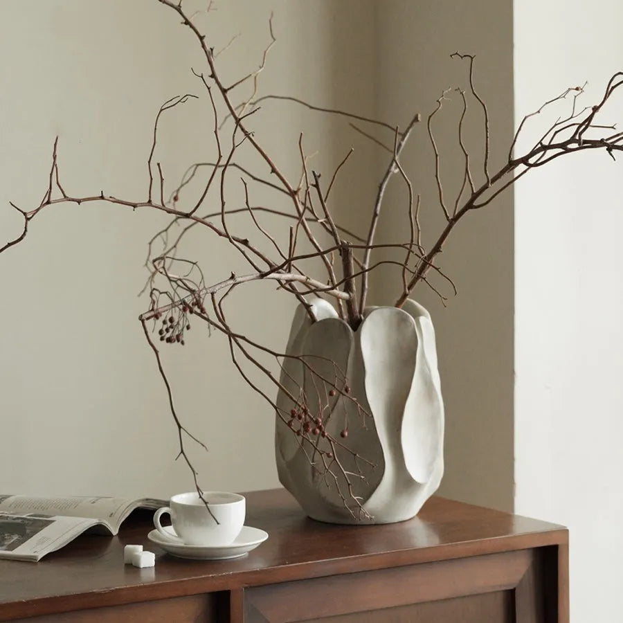 Irregular ceramic vase in art style shape for flower arrangements