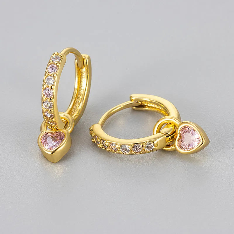 Women's heart-shaped drop earring with a dangling coloured stone, available in gold or white gold plating.