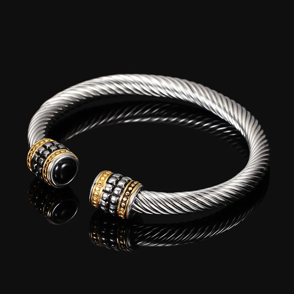 Two-tone vintage gold stainless steel bangle bracelet in black and golden finish