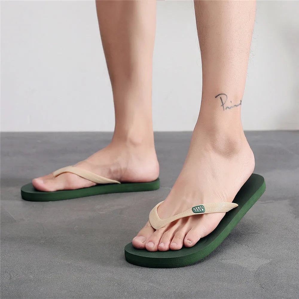 Men's black flip-flop with textured non-slip rubber sole and lightweight EVA upper strap.