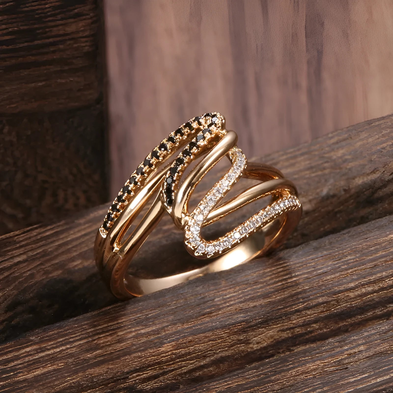 Fashion personality ring with micro-inlaid zircon detailing on copper with electroplated WK2230 finish.
