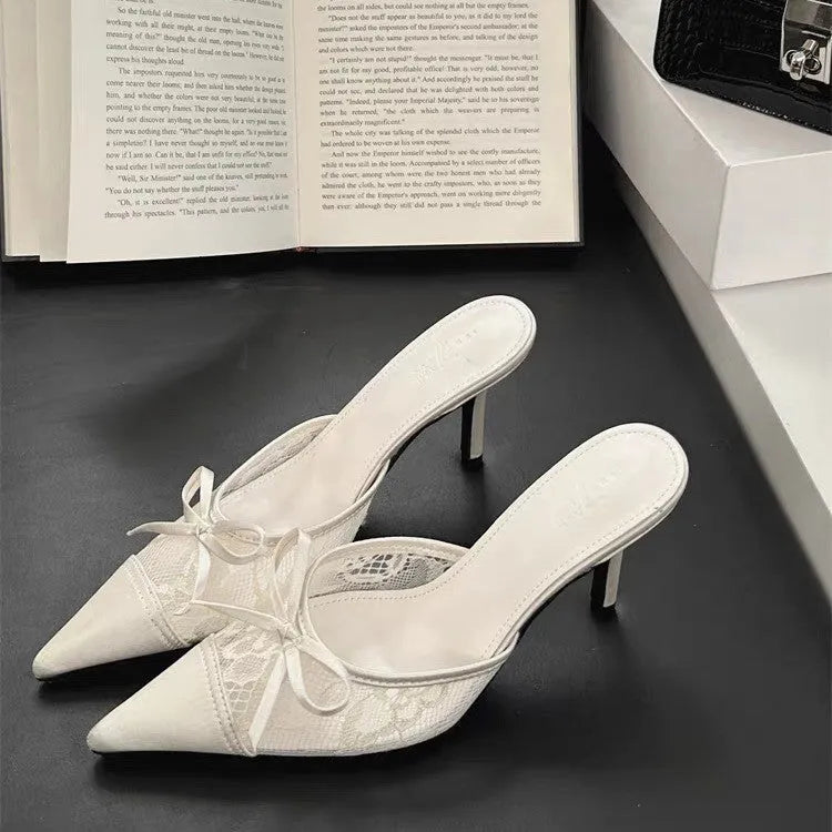 Women's light brown lace-up pointed toe high heels with a bowknot detail on the mesh upper.