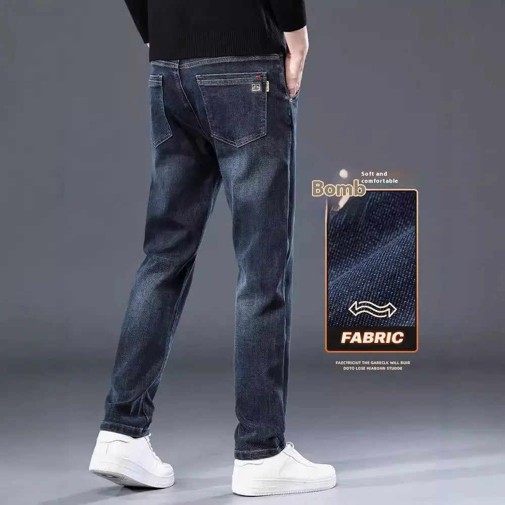 Man wearing slim straight blue-grey casual trousers with a micro-elastic waist for street fashion summer wear.