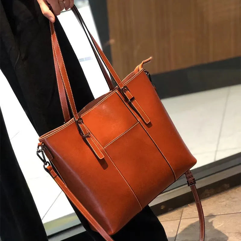 Genuine leather retro women's shoulder bag in horizontal square shape with three straps and sandwich pockets