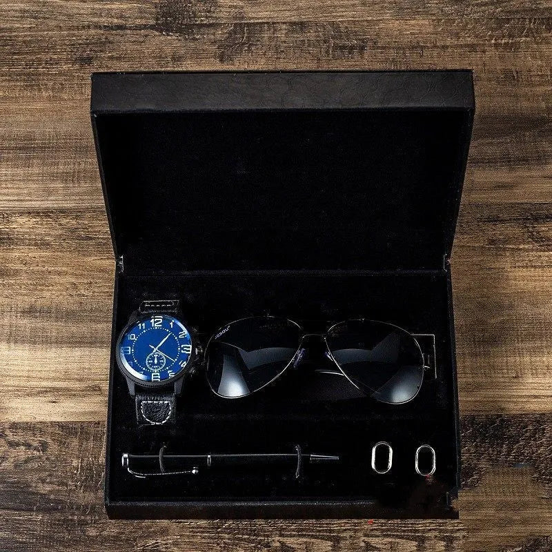 Men's gift set with brown leather watch, sunglasses, pen, and cufflinks in a gift box