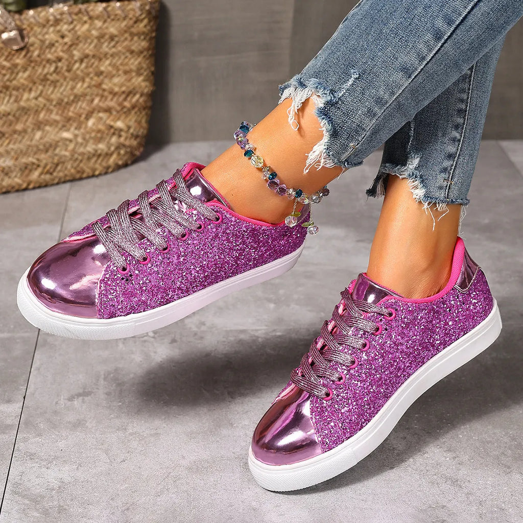 Women's plus size black lace-up board shoes with round toe and flat rubber sole.