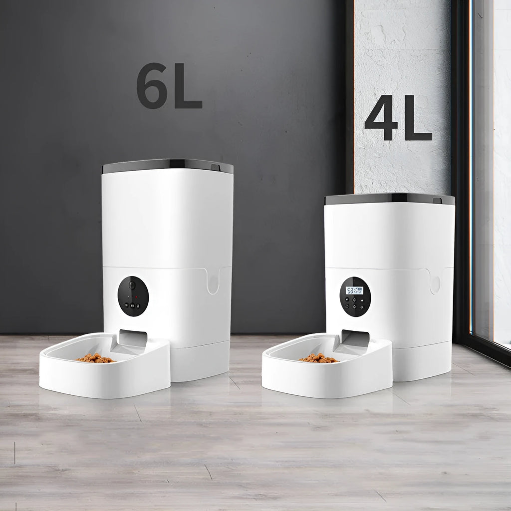 White smart pet automatic feeder with 6 litre capacity, stainless steel tray, and digital timer on a kitchen counter