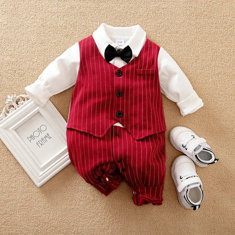 Baby boy wearing a wine red long-sleeved gentleman-style cotton jumpsuit with single-breasted closure.